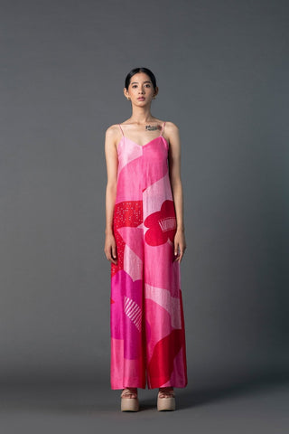 Front view of women’s fuchsia jumpsuit with shimmering sequin work, designed for parties and special occasions. Designed by Clos.