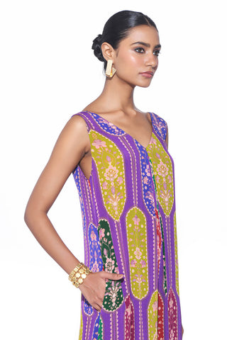 Close up of violet royal paisley jumpsuit. Perfect for cocktail parties, dinner date or bohemian theme parties or for sundown soirees.