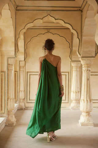 Indo Western Emerald Green One Shoulder Maxi Dress with floral cutwork embroidery  on habutai silk fabric designed by Paulmi and Harsh. A perfect women clothing a beach wear, party, summer wear, date dinner, a dress to flaunt and style.