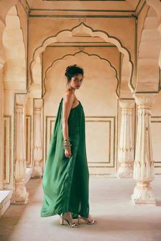 Indo Western Emerald Green One Shoulder Maxi Dress with floral cutwork embroidery  on habutai silk fabric designed by Paulmi and Harsh. A perfect women clothing a beach wear, party, summer wear, date dinner, a dress to flaunt and style.