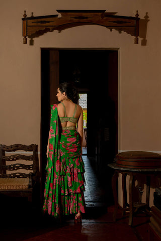 The green pre draped saree look from the back.