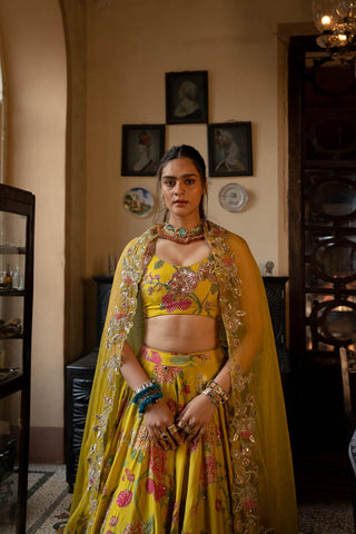 Paulmi and Harsh yellow floral hand embroidery lehenga set, a perfect wedding attire. 