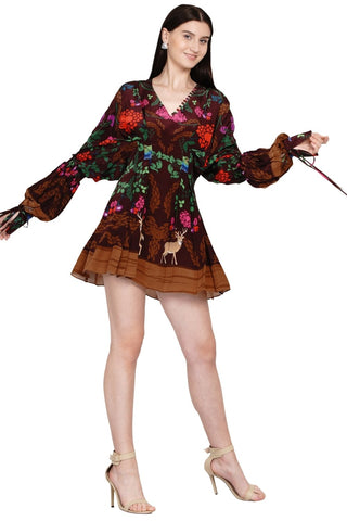 Richly printed V-neck dress with fabric loop detailing and exaggerated draped sleeves -a refined choice for casual chic or semi-formal gatherings.