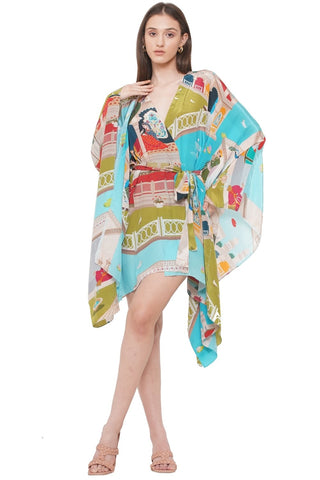 Lightweight draped-sleeve printed dress with fabric loop V-neckline, breezy and stylish choice for resort getaways or seaside dinners.