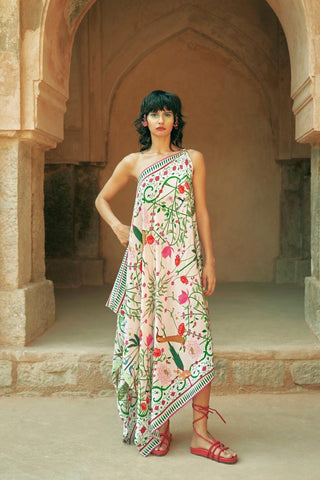 Asymmetrical one-shoulder dress with bow metal trim and engineered Kangra-inspired print, finished with a short-to-long hem for a modern silhouette. Designed by Limerick.