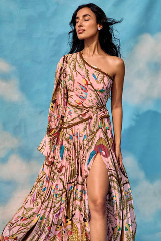 symmetrical one-shoulder embroidered dress with waist ruching, draped side slit, and tie-up cuff detail, exuding timeless elegance and modern glamour. Designed by Limerick.