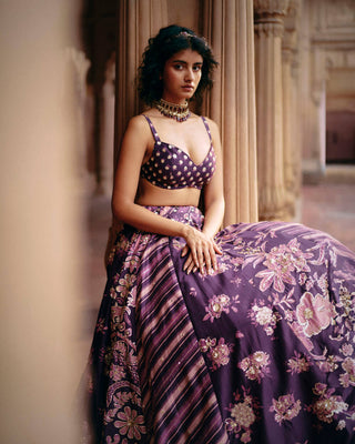 Close up look of the floral and leheriya lehenga for wedding ceremonies