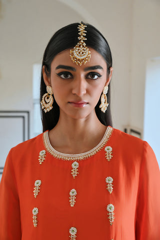 Orange bell sleeve kurta in viscose organza with floral butti embroidery. Trendy ethnic fashion women's wear.