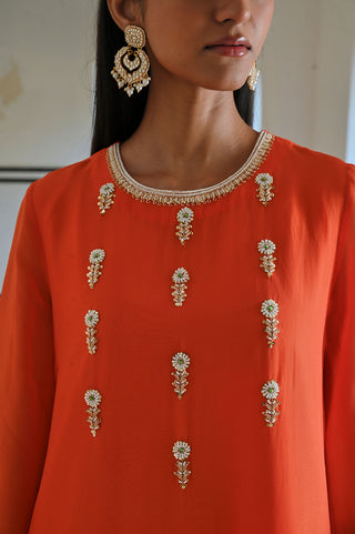Detailed floral butti embroidery on yoke in premium viscose organza. Perfect for weddings, festive celebrations, and special occasions.
