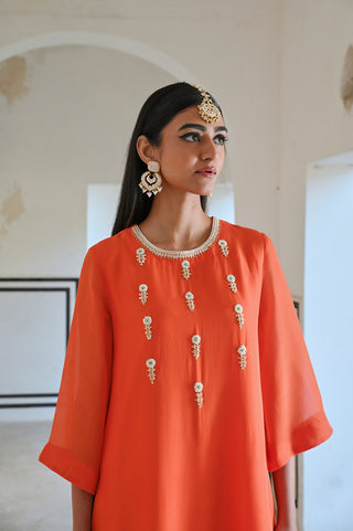 Orange Bell Sleeve Yoke Floral Butti Embroidered Kurta With Pants.