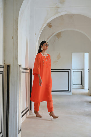Designer orange kurta set butti embrioded from the Rahi collection designed by Ease perfect for festive season.