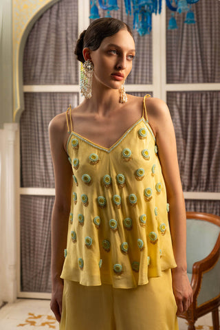 The close up look of the Pale Yellow Vegan Silk A-line Top with Hand Embriodered Chakri Flower.