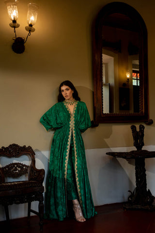 Designed by Paulmi and Harsh an emerald green Kaftan Set in jungle print russian jacquard in selfwoven fabric with drop sleeves, front slit and elastic gathers to accentuate the waist. 