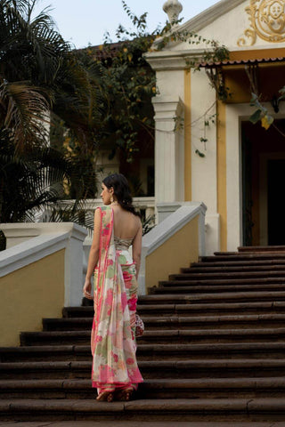 The Paulmi and Harsh model shocasing the back look of the saree.