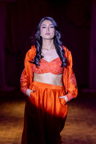 Model in designer Vermilion Silk Organza Designer 3-piece jacket set at Australian Fashion Grandeur runway.