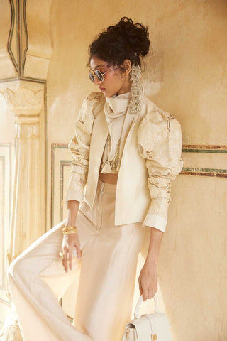 An Ivory Luxurious Silk Crop top and short Jacket Set W Scarf designed by Paulmi and Harsh. A perfect look for a party, summer wear, lunch get-together, office wear or an every day wear.