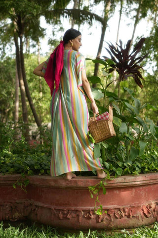 The back look of the multi coloured striped kaftan with knot detailing in the front designed by Paulmi and Harsh, the perfect outfit for your beach holiday.