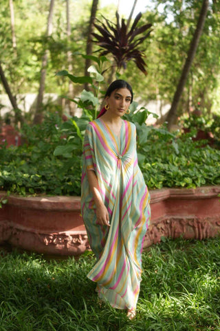 A multi coloured striped kaftan with knot detailing in the front designed by Paulmi and Harsh, the perfect outfit for your beach holiday.