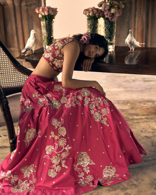 Close up look of the motif placement on each kali. The lehenga and blouse feature intricate hand–embroidery in zardozi, aari and sequins.