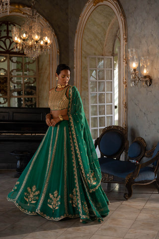 Emerald green hand embroidered lehenga set perfect for wedding ceremonies, mehndi night or festive parties.